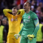 atletico-madrids-goalkeeper-jan-oblak-celebrates-victory-after-winning-the-penalty-shoot-out-at-the-end-of-his-champions-league-round-of-16-second-leg-soccer-match-against-bayer-leverkusen-in-madrid